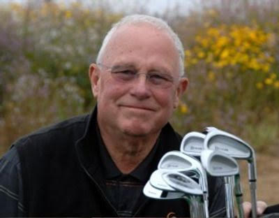 David Butler holding a set of his Butler Irons