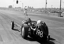 David Butler at the wheel of his fuel dragster, number 198, Detroit Dragway 1959